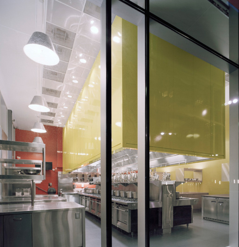 A shot of the George Brown Culinary School from the outside with a glance through the windows.