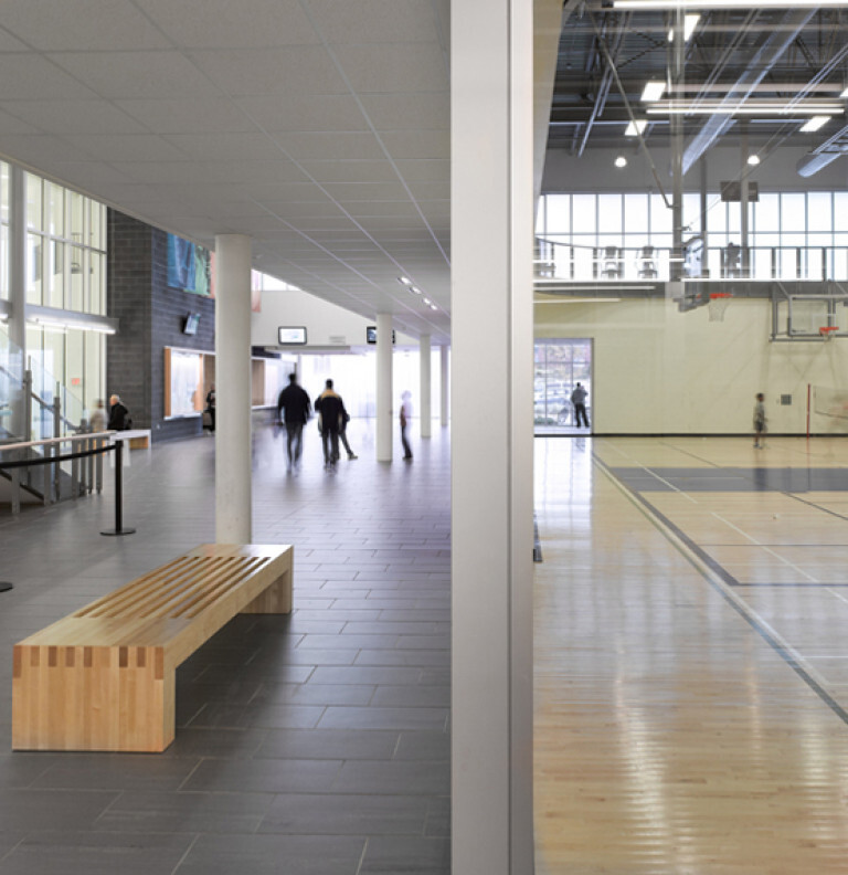 The hallway and the basketball court of the Bradford-West Gwillimbury Leisure Centre.