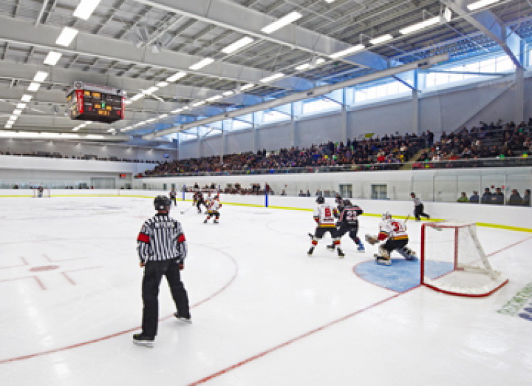 The ice rink of the Port Colborne Health & Wellness Centre - Aquicon design-bid-build services.