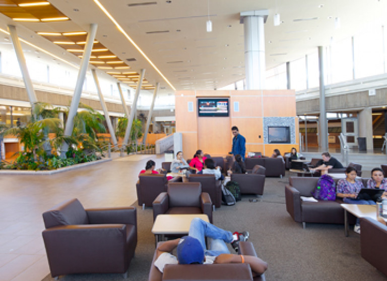 Students enjoying the lounge area of Niagara College - SAC - Aquicon design-build.