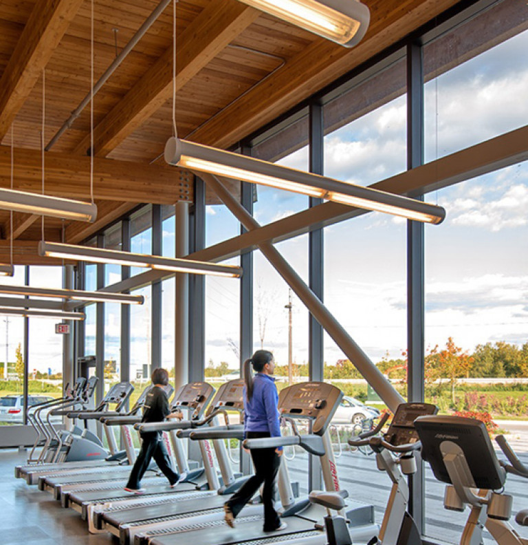 The gym of the Oak Ridges Community Centre with a beautiful view.