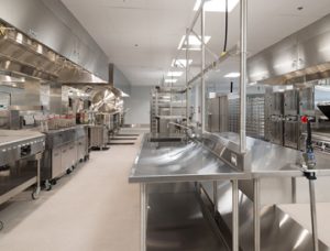 The stainless steel kitchen of the Vickers Dining Facility.