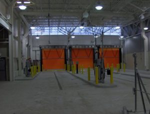 Roller doors and vehicle bays at Brampton Transit Facility.