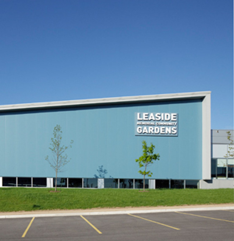 An wide view of the modern exterior to the Leaside Memorial Gardens Arena.