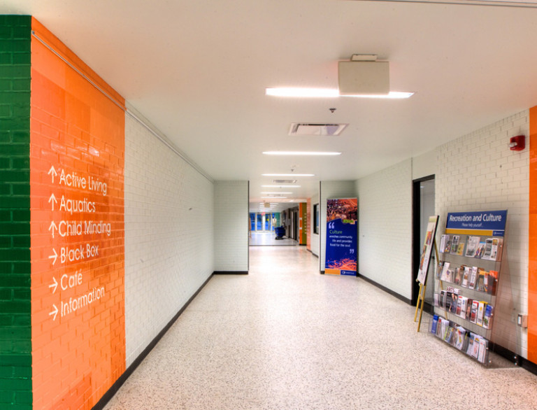 The Queen Elizabeth Park Community Centre features wide and open hallways.