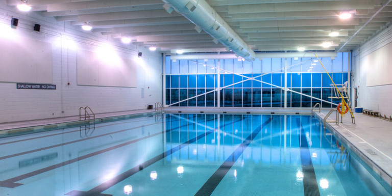 The Queen Elizabeth Park Community Centre features a large recreational pool for its community.