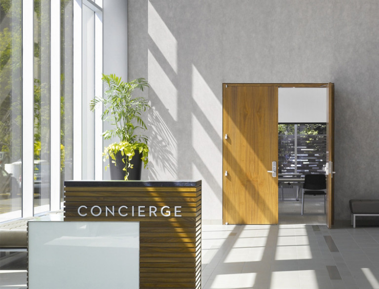 A modern design is defined by the concierge area of the Sherman Campus.