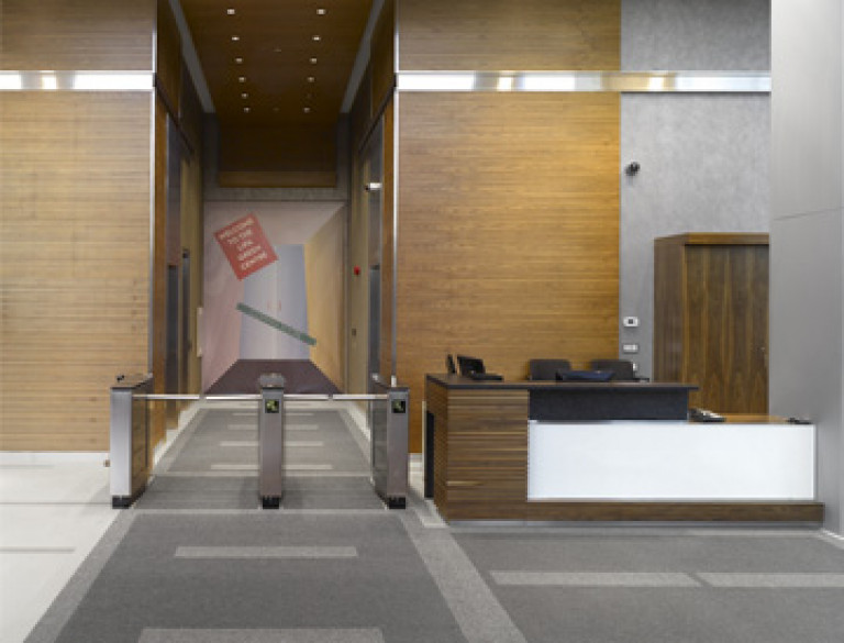 The Sherman Campus' reception space provides a modern receiving area for guests.