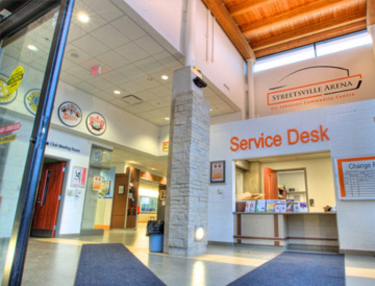 A modern service desk welcomes guests to the Vic Johnston Community Centre.