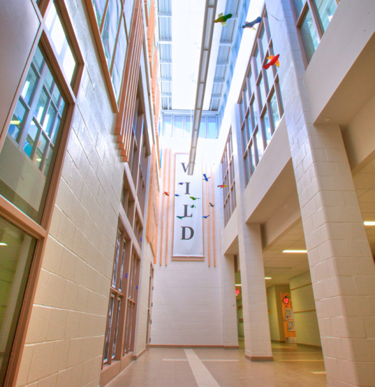 The high ceilings and bright corridors of the Whitby Shores Public School.