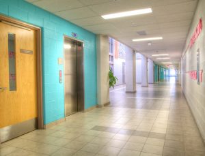 Wide and open hallways define the Whitby Shores Public School walkway space.